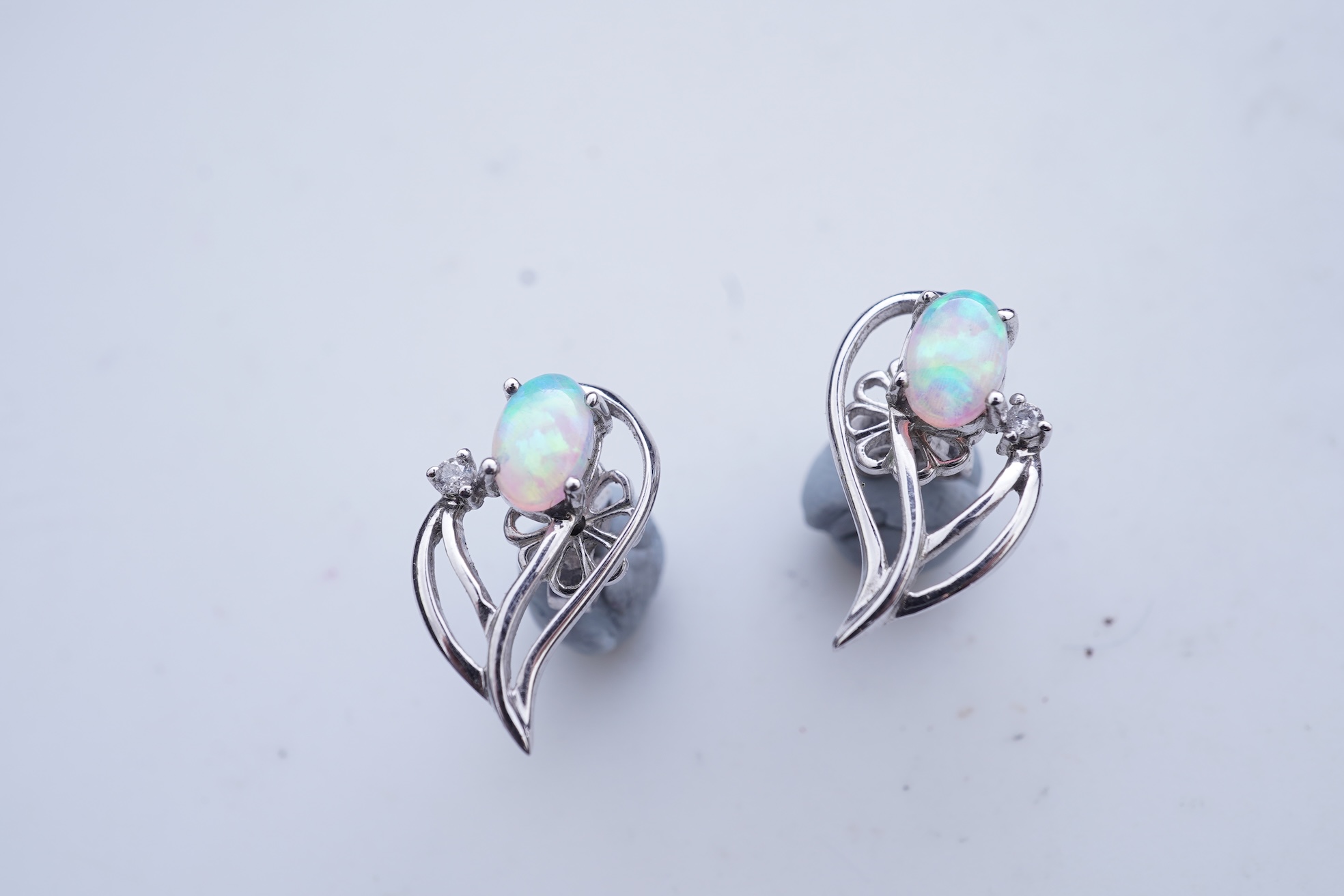 A synthetic opal demi-parure